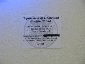DHG_Sheild_label